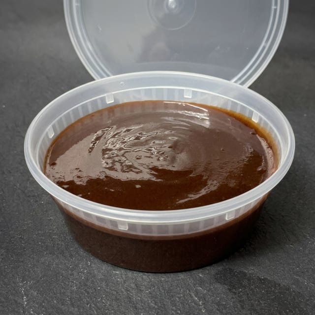 8oz. Spicy Island sauce.